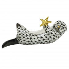 Herend sea otter with starfish